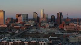 5.7K aerial stock footage approach and flyby the city's skyline at sunset in Downtown Nashville, Tennessee Aerial Stock Footage | DX0002_115_010