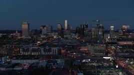 5.7K aerial stock footage wide view of the city skyline and high-rise under construction at twilight, Downtown Nashville, Tennessee Aerial Stock Footage | DX0002_115_033