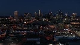 5.7K aerial stock footage ascend and flyby the city skyline at twilight, Downtown Nashville, Tennessee Aerial Stock Footage | DX0002_115_041