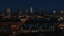 5.7K aerial stock footage slowly pass the city skyline at twilight and ascend, Downtown Nashville, Tennessee Aerial Stock Footage | DX0002_115_043