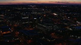 5.7K aerial stock footage slowly orbit and approach a hospital complex at twilight, Nashville, Tennessee Aerial Stock Footage | DX0002_115_047