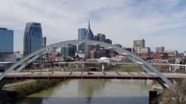 5.7K aerial stock footage fly over bridge to focus on the AT&T Building in Downtown Nashville, Tennessee Aerial Stock Footage | DX0002_116_010