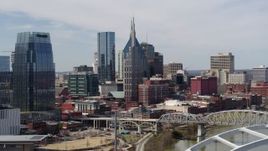 5.7K aerial stock footage of a view the AT&T Building seen from the river in Downtown Nashville, Tennessee Aerial Stock Footage | DX0002_116_035