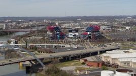 5.7K aerial stock footage approach Nissan Stadium while descending near the bridge in Nashville, Tennessee Aerial Stock Footage | DX0002_116_044