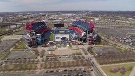 5.7K aerial stock footage circling around Nissan Stadium in Nashville, Tennessee Aerial Stock Footage | DX0002_117_012
