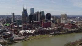 5.7K aerial stock footage slowly orbiting the city's skyline overlooking the Cumberland River, Downtown Nashville, Tennessee Aerial Stock Footage | DX0002_117_020
