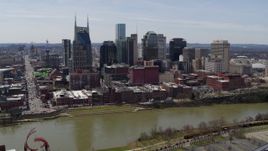 5.7K aerial stock footage a view of city's skyline across the Cumberland River, Downtown Nashville, Tennessee Aerial Stock Footage | DX0002_117_028