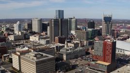 5.7K aerial stock footage of a high-rise hotel and skyscrapers in Downtown Nashville, Tennessee Aerial Stock Footage | DX0002_118_006