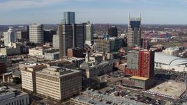 5.7K aerial stock footage orbit city buildings near high-rise hotel and skyscrapers in Downtown Nashville, Tennessee Aerial Stock Footage | DX0002_118_014