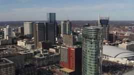 5.7K aerial stock footage a reverse view of Renaissance Hotel, reveal JW Marriott hotel in Downtown Nashville, Tennessee Aerial Stock Footage | DX0002_119_001