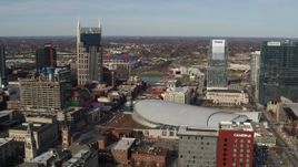 5.7K aerial stock footage reverse view of AT&T Building, Broadway, Bridgestone Arena, Pinnacle skyscraper, Downtown Nashville, Tennessee Aerial Stock Footage | DX0002_119_012