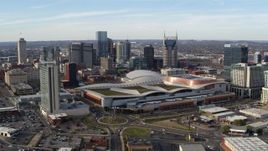 5.7K aerial stock footage passing by Nashville Music City Center and city's skyline, Downtown Nashville, Tennessee Aerial Stock Footage | DX0002_119_022