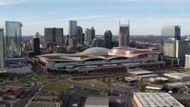 5.7K aerial stock footage fly away from and pass Nashville Music City Center and city's skyline, Downtown Nashville, Tennessee Aerial Stock Footage | DX0002_119_028