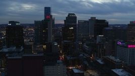 5.7K aerial stock footage flying by a group of tall skyscrapers at twilight, Downtown Nashville, Tennessee Aerial Stock Footage | DX0002_120_037