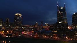 5.7K aerial stock footage orbit Broadway and AT&T Building at twilight, reveal Pinnacle skyscraper, Downtown Nashville, Tennessee Aerial Stock Footage | DX0002_121_007