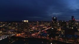 5.7K aerial stock footage fly away from Pinnacle skyscraper and AT&T Building for view of Broadway at twilight, Downtown Nashville, Tennessee Aerial Stock Footage | DX0002_121_008