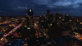 5.7K aerial stock footage approach the city's skyline and AT&T Building from river at twilight, Downtown Nashville, Tennessee Aerial Stock Footage | DX0002_121_011