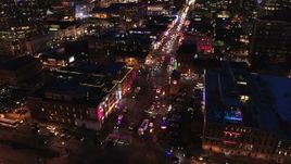 5.7K aerial stock footage approach the river end of Broadway and tilt to traffic at twilight, Downtown Nashville, Tennessee Aerial Stock Footage | DX0002_121_016