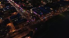 5.7K aerial stock footage fly away from bird's eye of Broadway and traffic at twilight, Downtown Nashville, Tennessee Aerial Stock Footage | DX0002_121_017