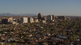 5.7K aerial stock footage of slowly flying by the city's high-rises, seen from homes, Downtown Albuquerque, New Mexico Aerial Stock Footage | DX0002_122_010