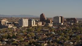 5.7K aerial stock footage of ascending with a view of the city's office high-rises, Downtown Albuquerque, New Mexico Aerial Stock Footage | DX0002_122_014