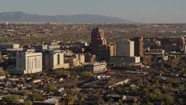 5.7K aerial stock footage of approaching and passing the city's office high-rises, Downtown Albuquerque, New Mexico Aerial Stock Footage | DX0002_122_017