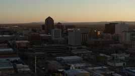5.7K aerial stock footage of orbiting high-rise office buildings at sunset, Downtown Albuquerque, New Mexico Aerial Stock Footage | DX0002_122_041