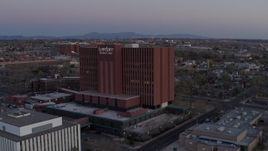 5.7K aerial stock footage of approaching a hospital at sunset in Albuquerque, New Mexico Aerial Stock Footage | DX0002_123_001