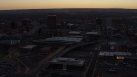 5.7K aerial stock footage orbiting Albuquerque Plaza and Hyatt Regency at sunset, Downtown Albuquerque, New Mexico Aerial Stock Footage | DX0002_123_013