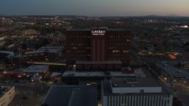 5.7K aerial stock footage of circling a hospital at twilight in Albuquerque, New Mexico Aerial Stock Footage | DX0002_123_020