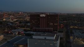 5.7K aerial stock footage approach a hospital building at twilight in Albuquerque, New Mexico Aerial Stock Footage | DX0002_123_022