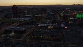 5.7K aerial stock footage approach a hotel and office buildings at twilight, Downtown Albuquerque, New Mexico Aerial Stock Footage | DX0002_123_023