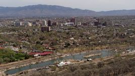5.7K aerial stock footage wide view of high-rise office buildings seen from Tingley Beach, Downtown Albuquerque, New Mexico Aerial Stock Footage | DX0002_124_003