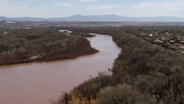 5.7K aerial stock footage of a reverse view of the Rio Grande river in Albuquerque, New Mexico Aerial Stock Footage | DX0002_124_014