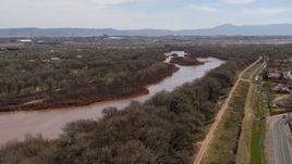 5.7K aerial stock footage of flying by the Rio Grande river in Albuquerque, New Mexico Aerial Stock Footage | DX0002_124_015