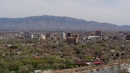 5.7K aerial stock footage of a wide view of high-rise office buildings, distant mountains, Downtown Albuquerque, New Mexico Aerial Stock Footage | DX0002_124_017