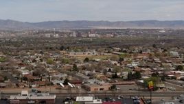 5.7K aerial stock footage of Downtown Albuquerque, seen from suburban homes, New Mexico Aerial Stock Footage | DX0002_126_011