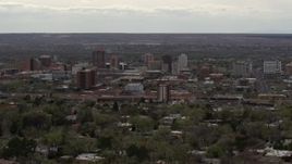 5.7K aerial stock footage of the city's high-rise buildings seen from neighborhood, Downtown Albuquerque, New Mexico Aerial Stock Footage | DX0002_126_036