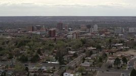 5.7K aerial stock footage wide view of city's high-rises seen while passing by neighborhood, Downtown Albuquerque, New Mexico Aerial Stock Footage | DX0002_126_040