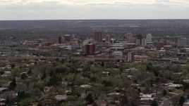 5.7K aerial stock footage wide view of city's high-rises seen from neighborhood, Downtown Albuquerque, New Mexico Aerial Stock Footage | DX0002_126_042