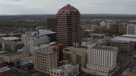 5.7K aerial stock footage approaching the Albuquerque Plaza office building, Downtown Albuquerque, New Mexico Aerial Stock Footage | DX0002_127_004