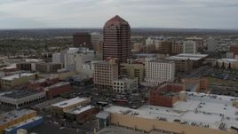 5.7K aerial stock footage circling Albuquerque Plaza and neighboring city buildings, Downtown Albuquerque, New Mexico Aerial Stock Footage | DX0002_127_009