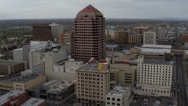 5.7K aerial stock footage fly toward Albuquerque Plaza and neighboring city buildings, Downtown Albuquerque, New Mexico Aerial Stock Footage | DX0002_127_010