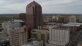 5.7K aerial stock footage of Albuquerque Plaza and other city buildings during descent, Downtown Albuquerque, New Mexico Aerial Stock Footage | DX0002_127_013