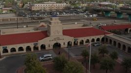 5.7K aerial stock footage of an orbit of the Albuquerque train station, Downtown Albuquerque, New Mexico Aerial Stock Footage | DX0002_127_019