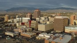 5.7K aerial stock footage approach and flyby Albuquerque Plaza towering over city buildings, Downtown Albuquerque, New Mexico Aerial Stock Footage | DX0002_127_029