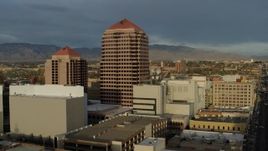5.7K aerial stock footage approach office high-rise for stationary view, Downtown Albuquerque, New Mexico Aerial Stock Footage | DX0002_127_038