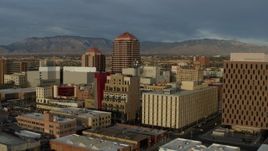 5.7K aerial stock footage orbit office high-rise at the center of city buildings, Downtown Albuquerque, New Mexico Aerial Stock Footage | DX0002_127_041