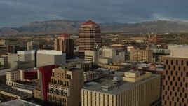 5.7K aerial stock footage fly away from office high-rise, reveal federal building, Downtown Albuquerque, New Mexico Aerial Stock Footage | DX0002_127_043