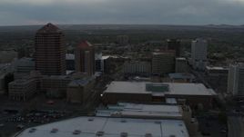 5.7K aerial stock footage orbit office high-rise, hotel, and the Kiva Auditorium at sunset, Downtown Albuquerque, New Mexico Aerial Stock Footage | DX0002_128_006